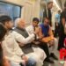 PM Modi takes metro ride to attend DU event, chats with co-passengers