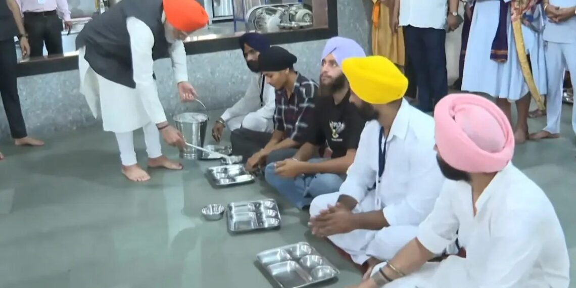 Watch: PM Modi wears turban; serves langar at Sri Patna Sahib Gurdwara