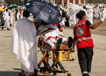 Medical team evacuates a Muslim pilgrim during hajj pilgrimage