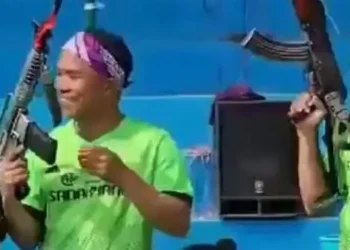 Football match in maniputr with AK-47