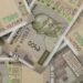 Indian Rupee rises 9 paise to 87.28 versus the US dollar in early trade