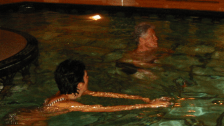 Epstein Files Shocker: Bill Clinton Pictured in Red Dress, High Heels