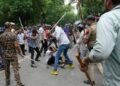 Police Crackdown on Students: Mystery Men, Batons, and Brutality