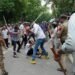 Police Crackdown on Students: Mystery Men, Batons, and Brutality