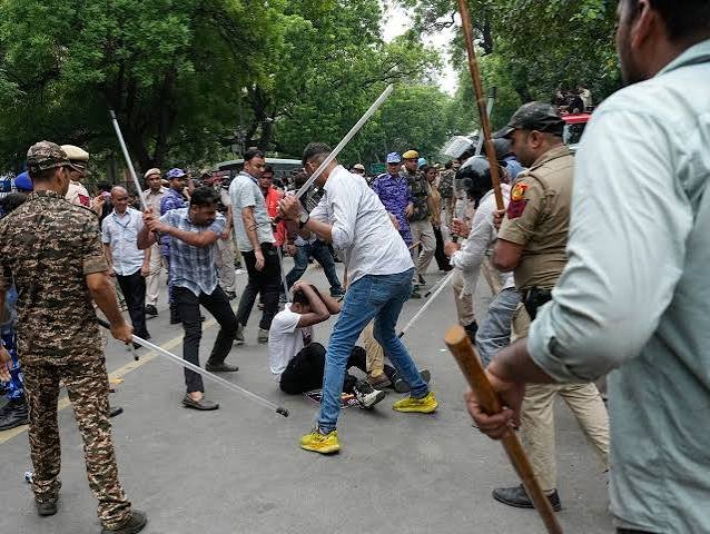 Police Crackdown on Students: Mystery Men, Batons, and Brutality